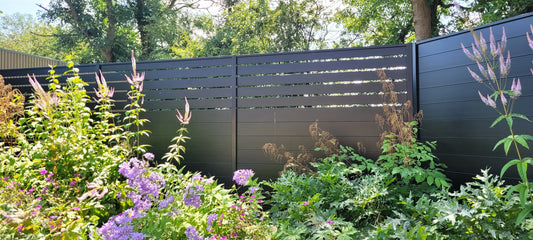 Image showcasing Durapost SLEEK aluminium half screen half privacy fence panels in black 